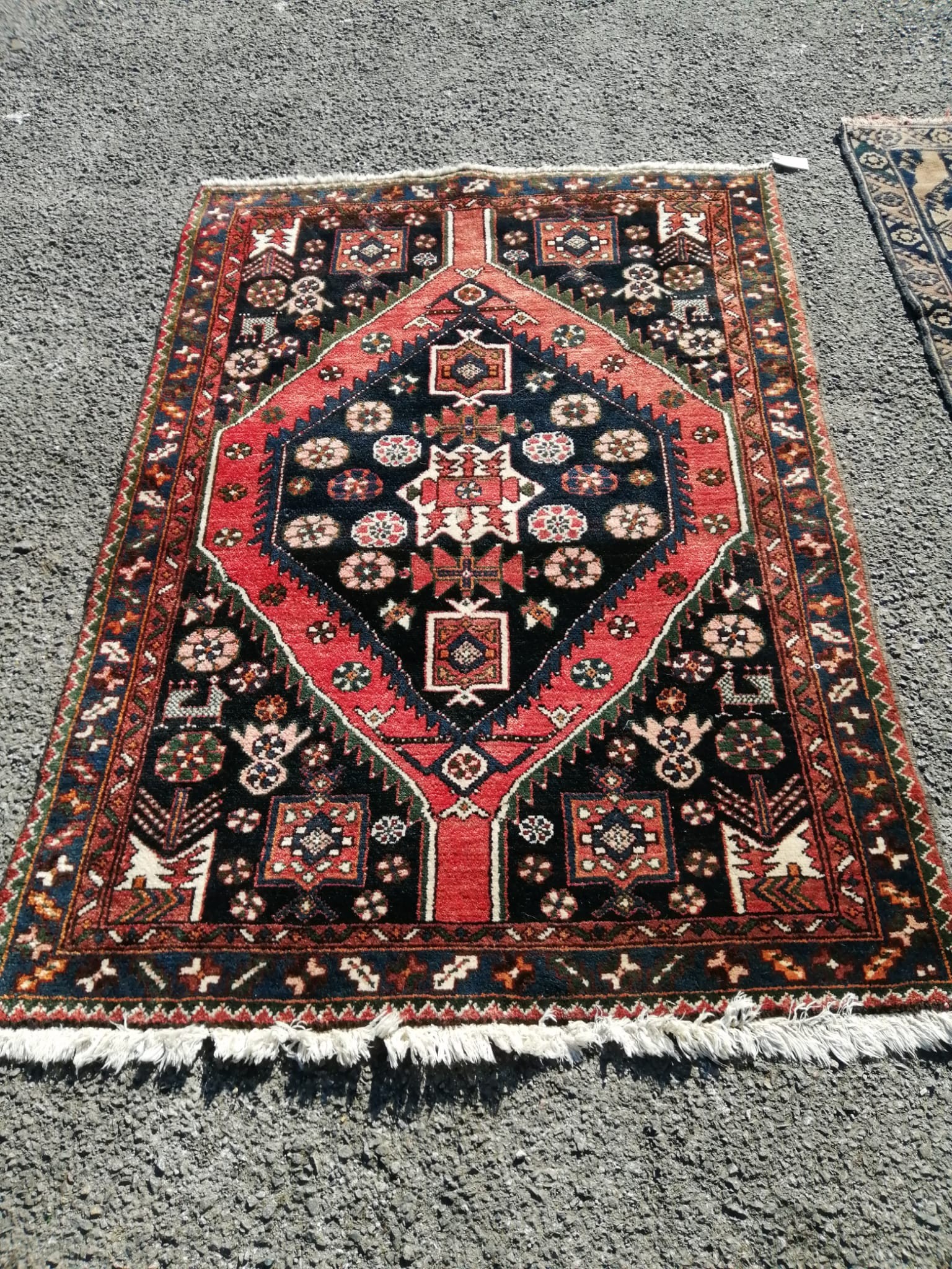 A Caucasian blue ground rug, 160 x 112cm